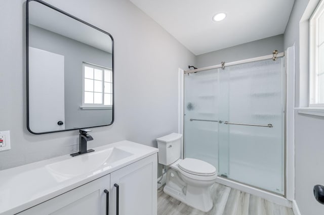 153 Birch, Fresno, CA 93650 - full bath featuring a stall shower, toilet, wood finished floors, vanity, and recessed lighting