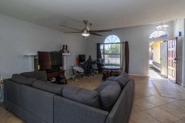 3626 E Stewart Ct, Visalia, CA 93292 - living area featuring light tile patterned floors, baseboards, and ceiling fan