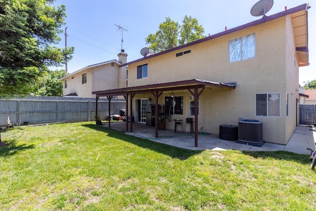 3626 E Stewart Ct, Visalia, CA 93292 - rear view of house with stucco siding, a patio area, and central AC unit