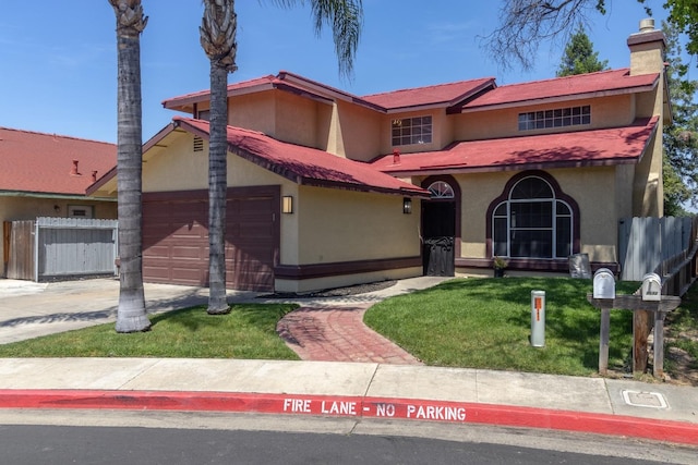 3626 E Stewart Ct, Visalia, CA 93292 - mediterranean / spanish-style home with stucco siding, a chimney, an attached garage, and driveway