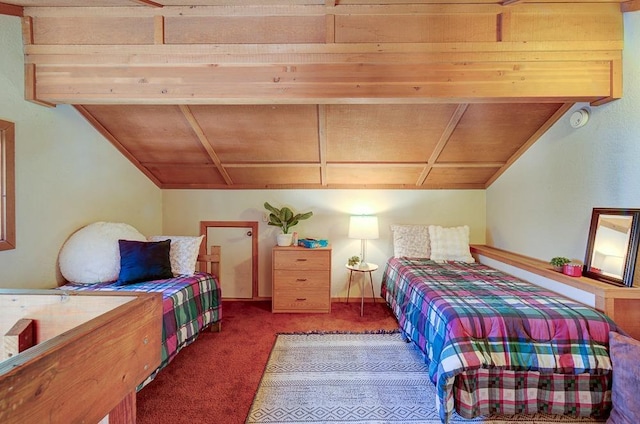 carpeted bedroom featuring wood ceiling, vaulted ceiling, and baseboards