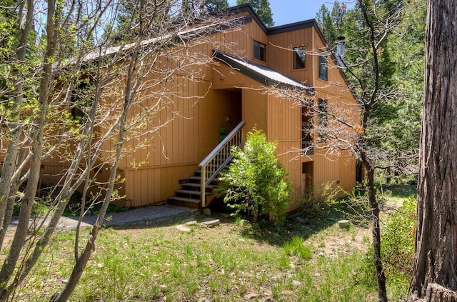rear view of house with stairs