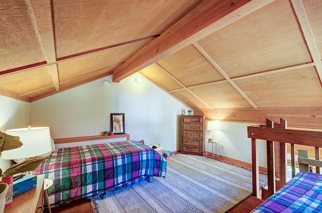 bedroom with wood finished floors and baseboards