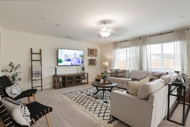 1890 Richard Ave Unit 2054S, Sanger, CA 93657 - carpeted living room featuring baseboards and a ceiling fan