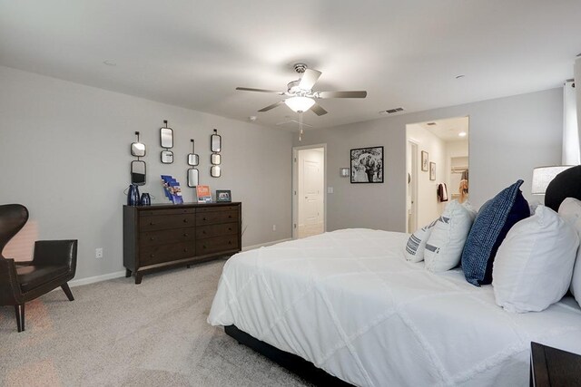 1890 Richard Ave Unit 2054S, Sanger, CA 93657 - bedroom with light colored carpet, ceiling fan, and baseboards