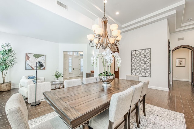 7762 N Hillsdale Dr, Fresno, CA 93720 - dining area with dark wood-type flooring, a raised ceiling, baseboards, a chandelier, and recessed lighting