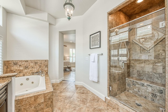 7762 N Hillsdale Dr, Fresno, CA 93720 - bathroom featuring a jetted tub, a stall shower, baseboards, tile patterned flooring, and vanity