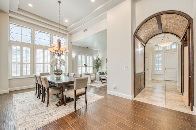 7762 N Hillsdale Dr, Fresno, CA 93720 - dining space featuring a chandelier, baseboards, light wood-style floors, recessed lighting, and high vaulted ceiling