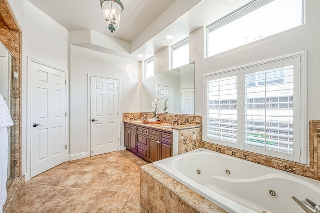 7762 N Hillsdale Dr, Fresno, CA 93720 - bathroom with double vanity, a whirlpool tub, a stall shower, a chandelier, and recessed lighting