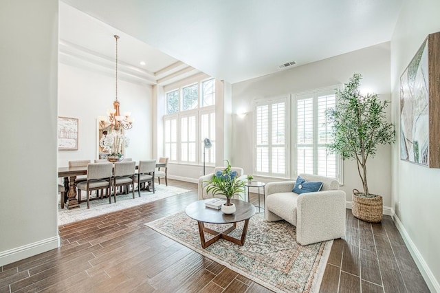 7762 N Hillsdale Dr, Fresno, CA 93720 - living area with a chandelier, baseboards, a raised ceiling, dark wood-style floors, and recessed lighting