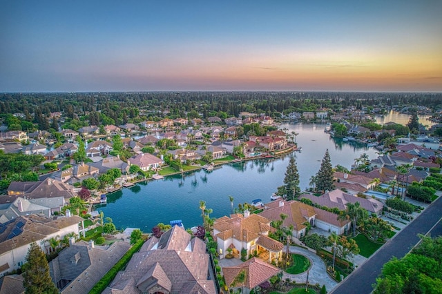 2589 W Lake Van Ness Cir, Fresno, CA 93711 - aerial view of property and surrounding area with a large body of water and nearby suburban area