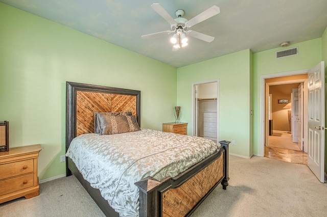 2589 W Lake Van Ness Cir, Fresno, CA 93711 - bedroom with light carpet, baseboards, ceiling fan, and a closet
