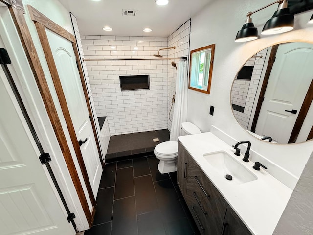 7784 S Del Rey Ave, Del Rey, CA 93616 - bathroom with tiled shower, toilet, tile patterned flooring, recessed lighting, and vanity