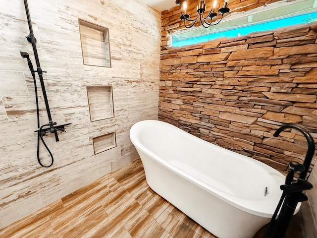 7784 S Del Rey Ave, Del Rey, CA 93616 - bathroom featuring a freestanding bath, a tile shower, and a chandelier