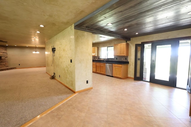 7784 S Del Rey Ave, Del Rey, CA 93616 - kitchen featuring dishwasher, dark countertops, baseboards, open floor plan, and recessed lighting