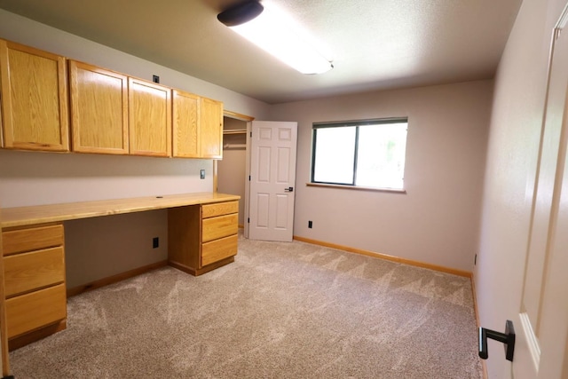 7784 S Del Rey Ave, Del Rey, CA 93616 - unfurnished office featuring built in study area, light colored carpet, and baseboards