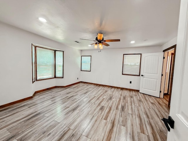 7784 S Del Rey Ave, Del Rey, CA 93616 - spare room featuring a ceiling fan, light wood finished floors, recessed lighting, and baseboards