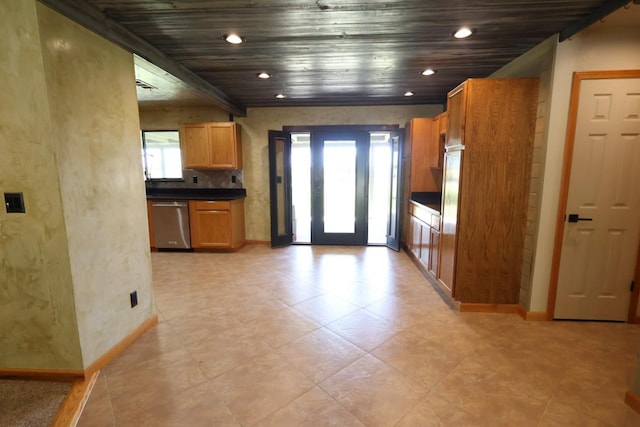 7784 S Del Rey Ave, Del Rey, CA 93616 - kitchen featuring healthy amount of natural light, stainless steel dishwasher, baseboards, dark countertops, and wood ceiling