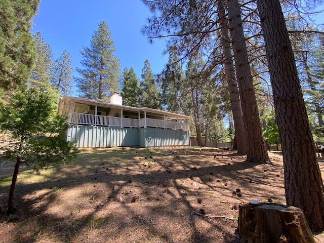 50740 Chu Ranch Rd, Oakhurst, CA 93644 - back of property with a chimney