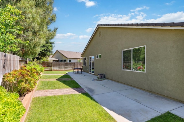 2315 Creekview Dr, Merced, CA 95340 - rear view of house featuring a patio and stucco siding