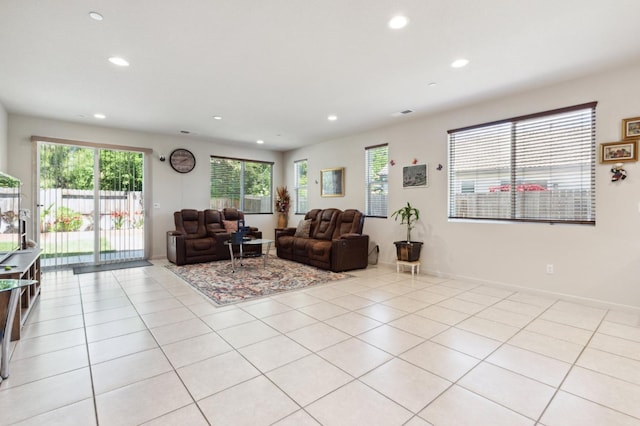 2315 Creekview Dr, Merced, CA 95340 - living area with recessed lighting, plenty of natural light, light tile patterned flooring, and baseboards
