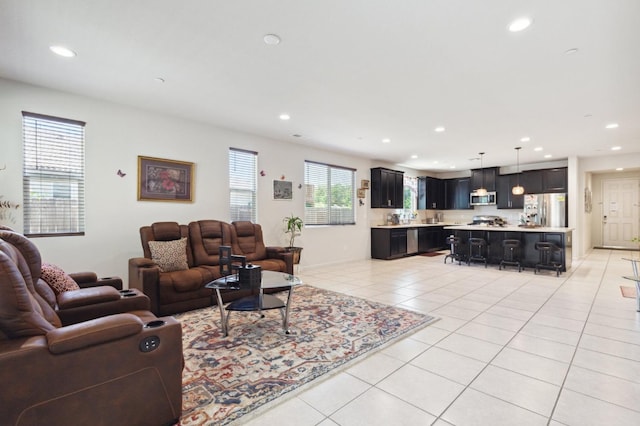 2315 Creekview Dr, Merced, CA 95340 - living room featuring light tile patterned floors and recessed lighting