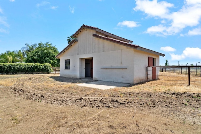 3365 N Emperor Ave, Fresno, CA 93737 - rear view of house with fence and concrete block siding