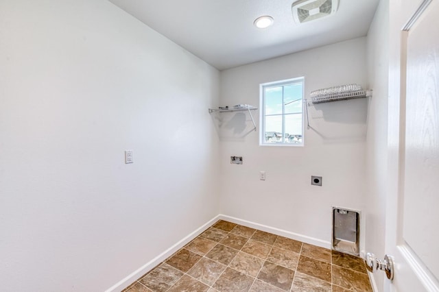 washroom featuring hookup for an electric dryer, baseboards, and washer hookup