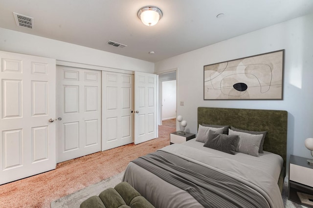 bedroom featuring carpet floors and a closet