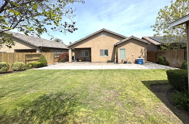 4717 W Joline Dr, Fresno, CA 93722 - rear view of house featuring a patio and stucco siding