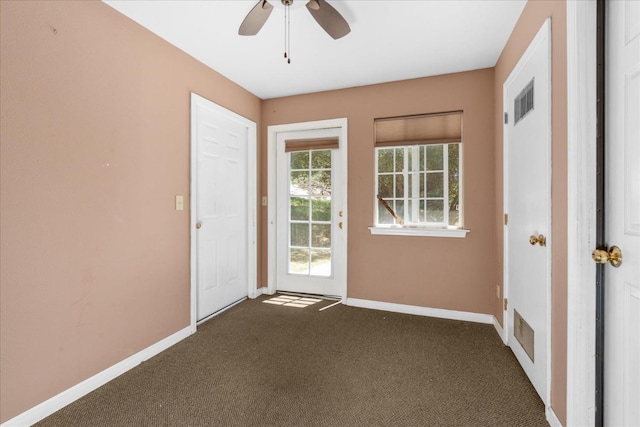 39976 Pierce Lake Dr, Oakhurst, CA 93644 - interior space with dark colored carpet, baseboards, and ceiling fan