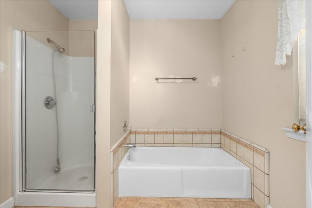 39976 Pierce Lake Dr, Oakhurst, CA 93644 - bathroom with a stall shower, a bath, and tile patterned floors