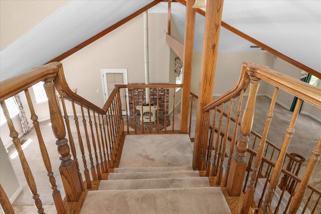 39976 Pierce Lake Dr, Oakhurst, CA 93644 - staircase with carpet flooring and vaulted ceiling