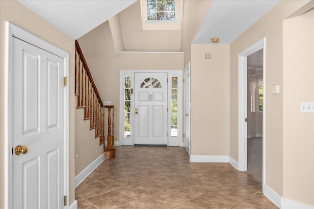 39976 Pierce Lake Dr, Oakhurst, CA 93644 - foyer entrance with healthy amount of natural light, baseboards, and lofted ceiling