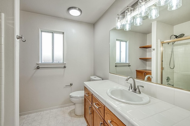 2113 E Portland Ave, Fresno, CA 93720 - bathroom with an enclosed shower, baseboards, toilet, and vanity