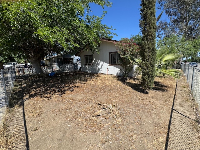 view of front facade featuring a fenced backyard