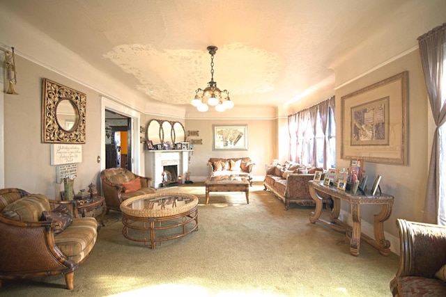 340 N Fulton St, Fresno, CA 93701 - carpeted living area featuring a chandelier, a fireplace, baseboards, and crown molding