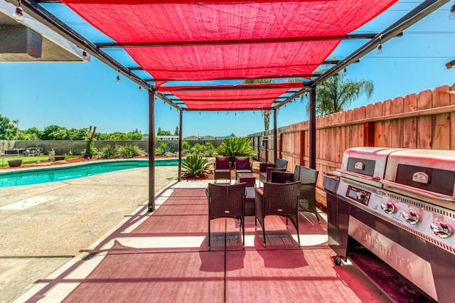 5932 E Illinois Ave, Fresno, CA 93727 - view of patio / terrace featuring area for grilling, a fenced backyard, and a pergola