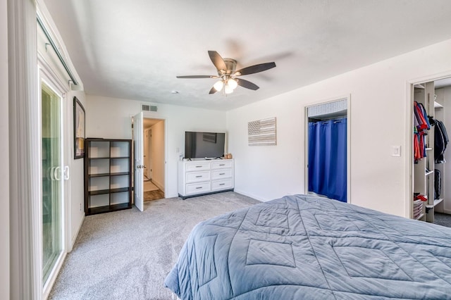 5932 E Illinois Ave, Fresno, CA 93727 - bedroom featuring carpet, a spacious closet, a ceiling fan, and baseboards