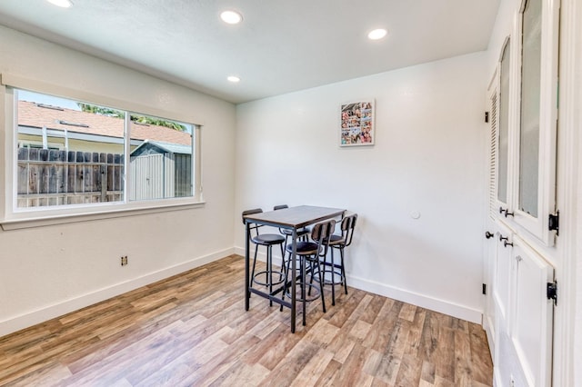 5932 E Illinois Ave, Fresno, CA 93727 - dining space with wood finished floors, recessed lighting, and baseboards