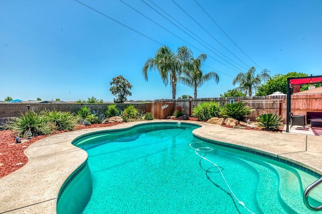 5932 E Illinois Ave, Fresno, CA 93727 - view of swimming pool with a fenced backyard and a patio