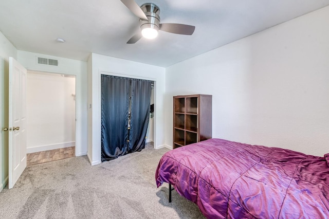 5932 E Illinois Ave, Fresno, CA 93727 - bedroom with carpet flooring, baseboards, and a ceiling fan