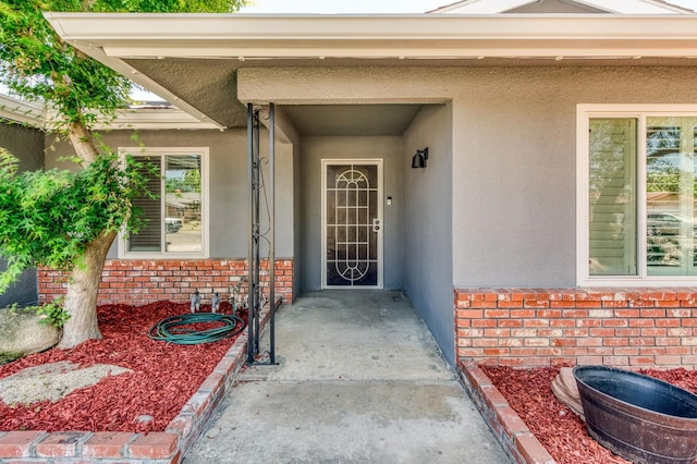 5932 E Illinois Ave, Fresno, CA 93727 - entrance to property with stucco siding and brick siding