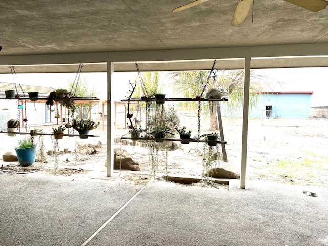 view of patio / terrace featuring a ceiling fan