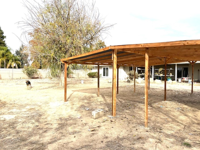 view of yard featuring fence