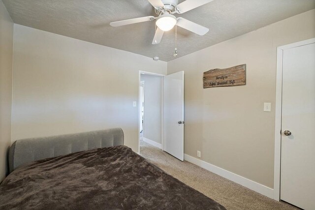 42640 Pinecone Ln, Auberry, CA 93602 - bedroom featuring light carpet, baseboards, and a ceiling fan