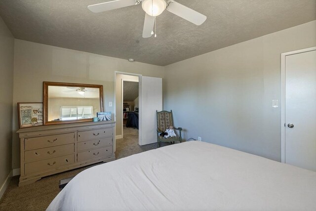 42640 Pinecone Ln, Auberry, CA 93602 - carpeted bedroom with a textured ceiling, baseboards, and a ceiling fan