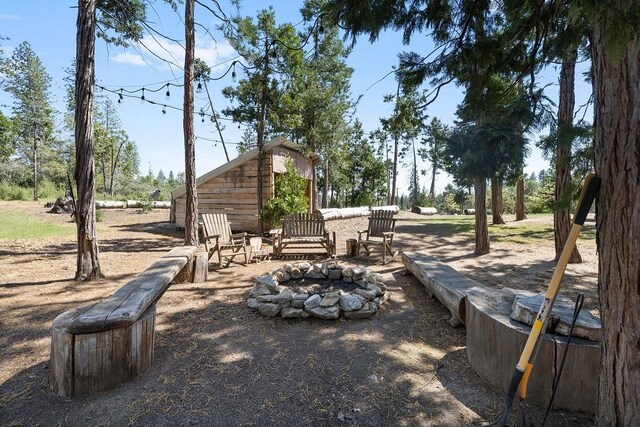 42640 Pinecone Ln, Auberry, CA 93602 - view of yard featuring a fire pit