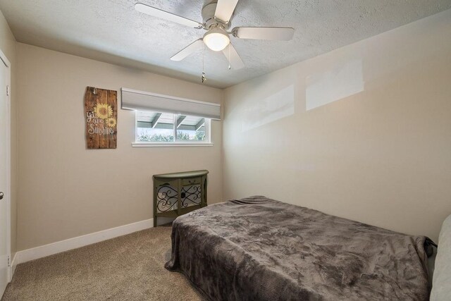 42640 Pinecone Ln, Auberry, CA 93602 - bedroom featuring carpet, baseboards, a textured ceiling, and a ceiling fan