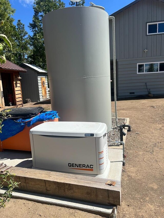 42640 Pinecone Ln, Auberry, CA 93602 - exterior view of a power unit and board and batten siding